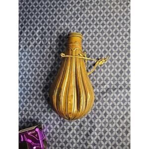 1800's original powder flask large dent on front. tip may be missing.